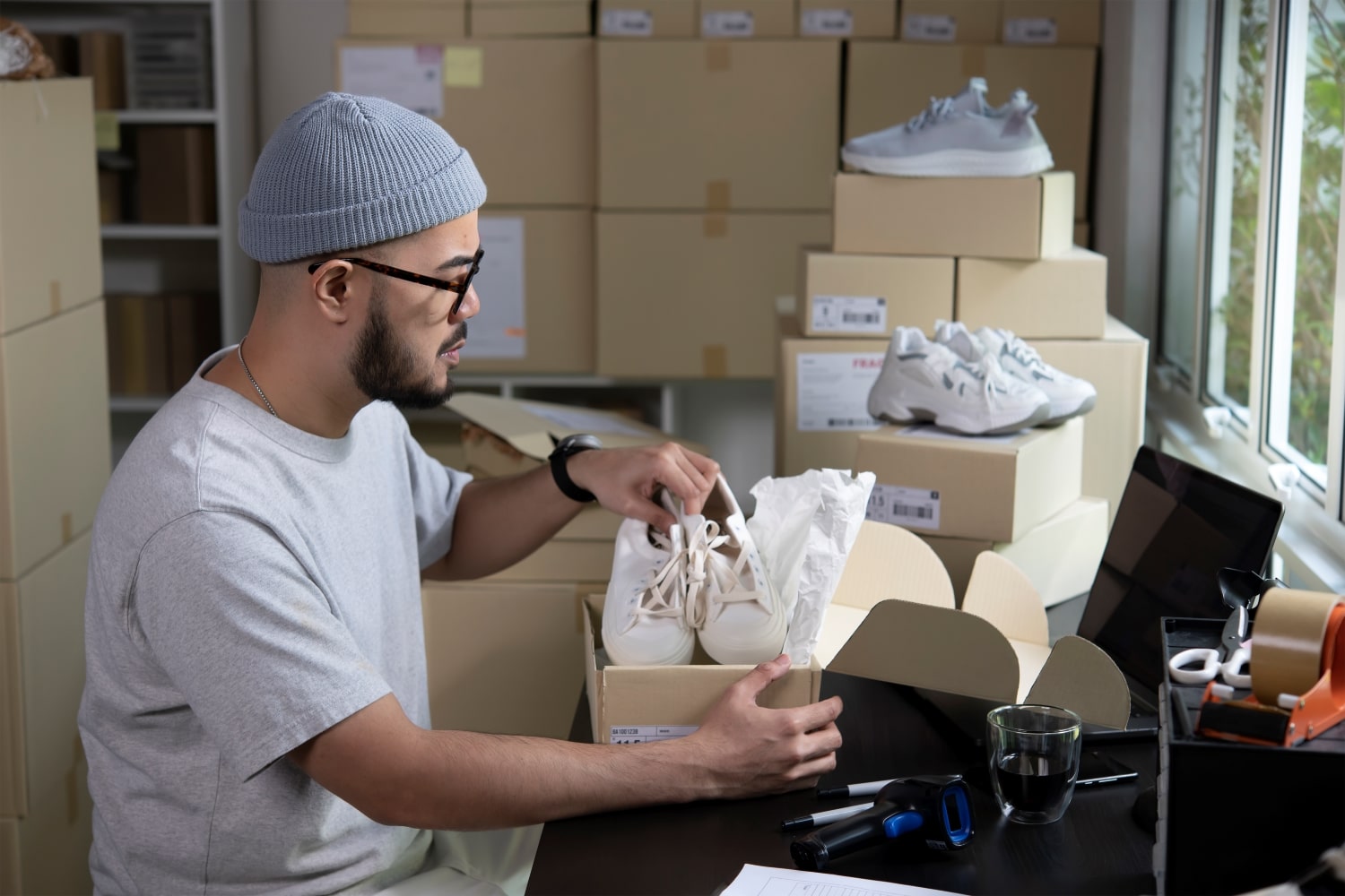 Ecommerce order being carefully packed for shipping